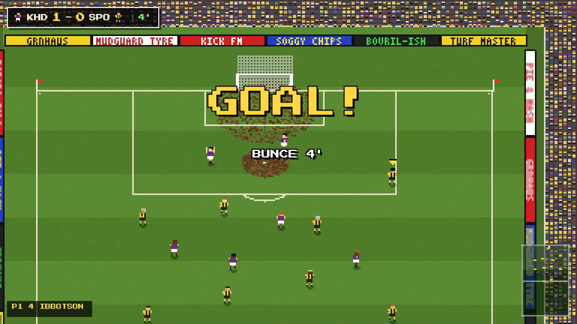 GOAL! A goal in a muddy goalmouth, with the sponsors’ boards behind the net